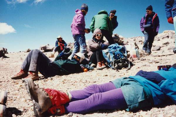 Exhausted climbers at Condors Nest on Aconcagua